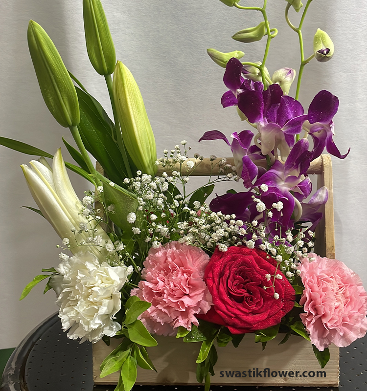 Orchids & Lilly’s Basket Arrangement