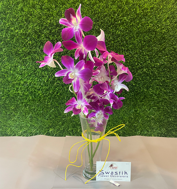 Purple Orchids in Glass Vase