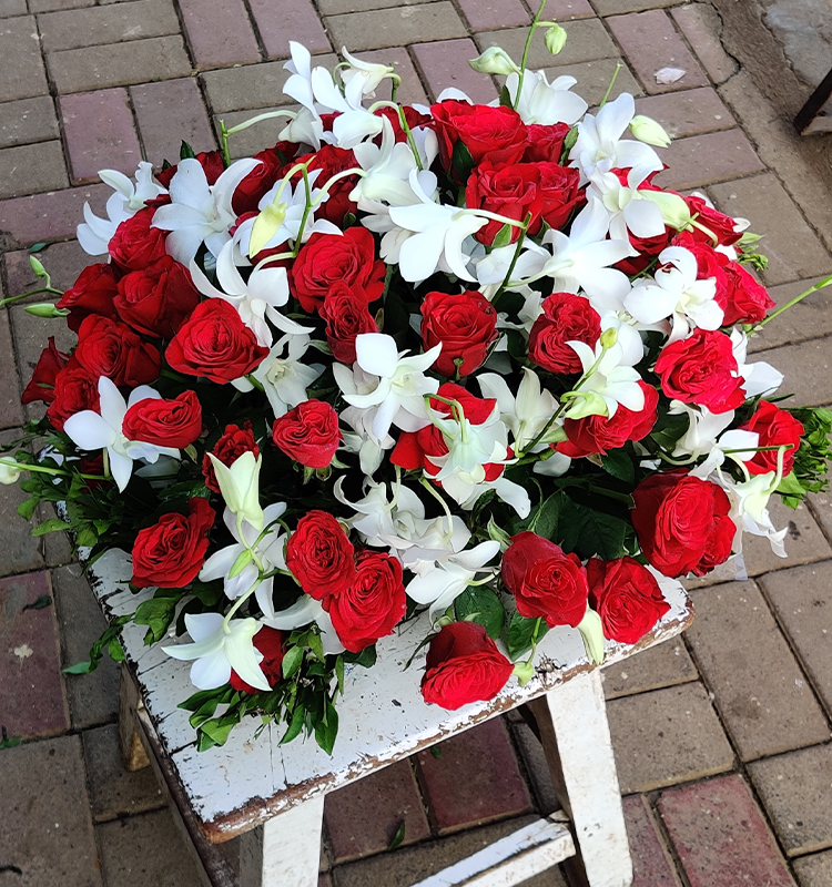 Roses & White Orchids Round Arrangement